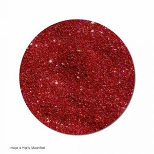 Red glitter texture, highly magnified view.