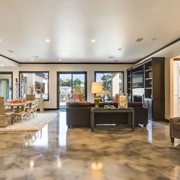 Modern living room with polished concrete floors.