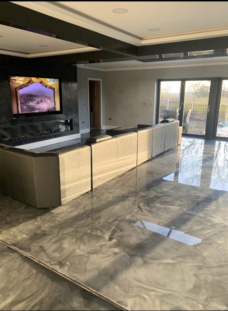 Modern living room with shiny marble floor.