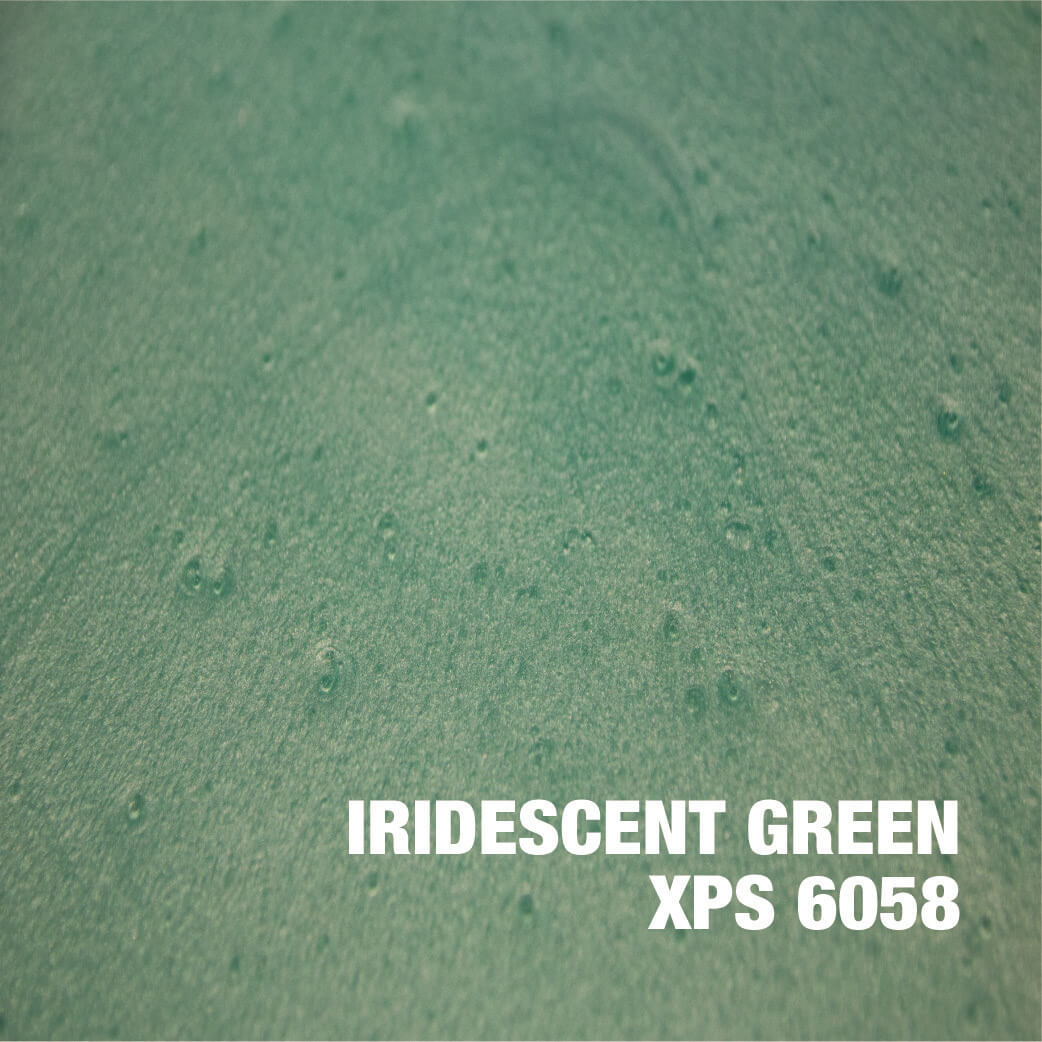 Iridescent green texture with XPS 6058 label.