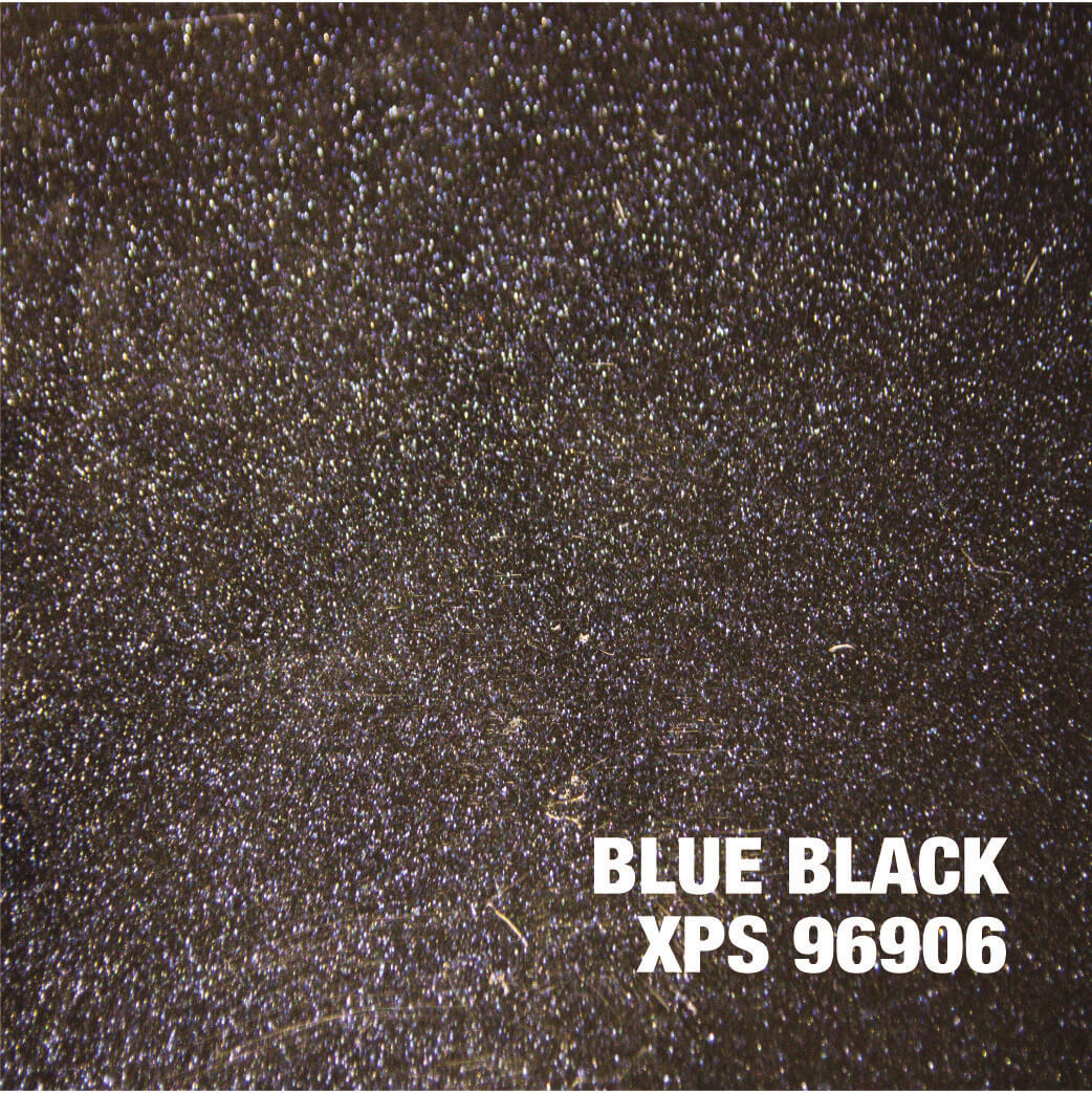 Blue-black textured surface with glittery specks.