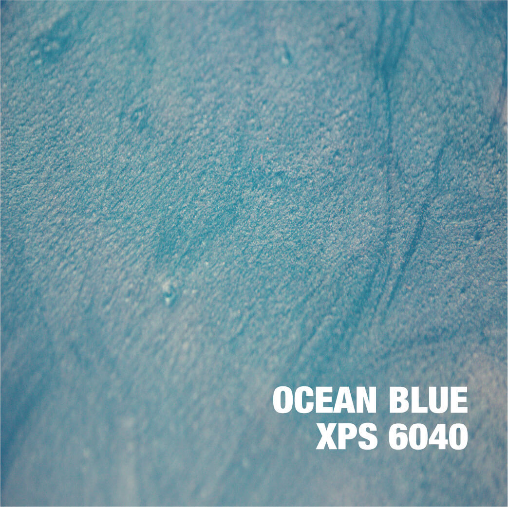 Ocean blue texture with text overlay.