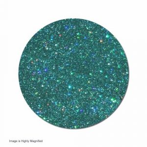Teal glitter with colorful sparkles, magnified.
